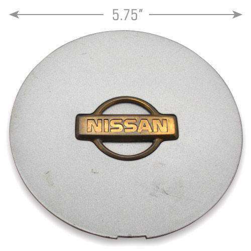 Nissan Center Cap Maxima 97, 98, 99 Part Number 999W17F150  Fits 15" 6 Spoke Wheel Gold Emblem